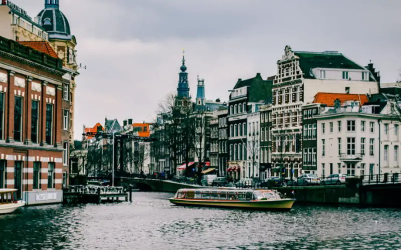 Amsterdam canals with a tourist boat