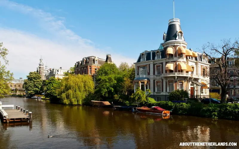 Big house next to a canal in Amsterdam