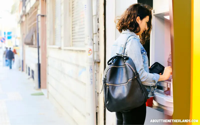 Woman using an ATM